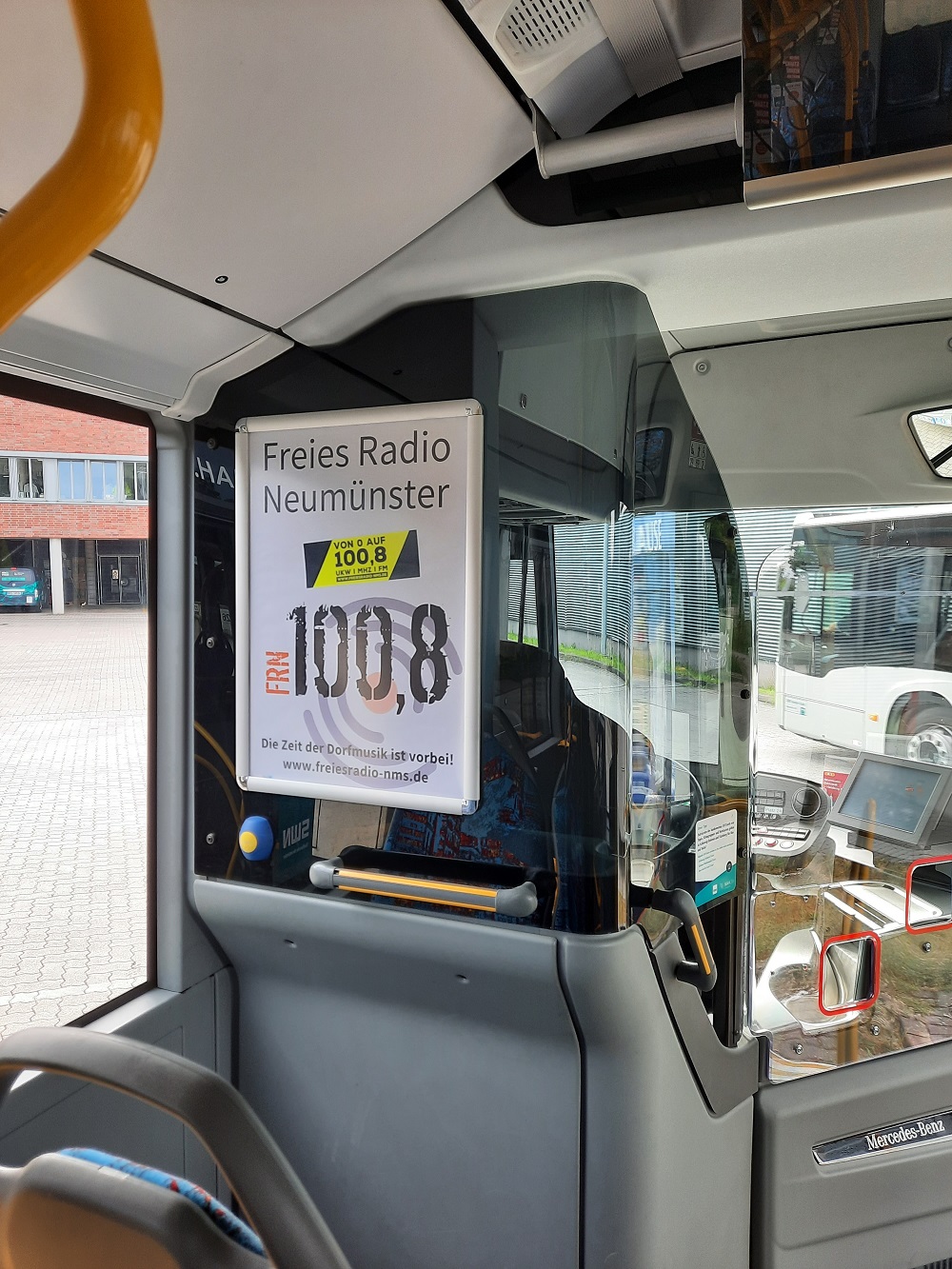 Poster im Bus